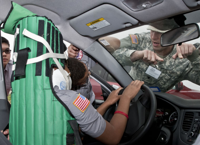 Beeson instructing through windshield